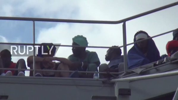 410 migrants, including children, arrive in Palermo after a Spanish vessel brings them safely ashore