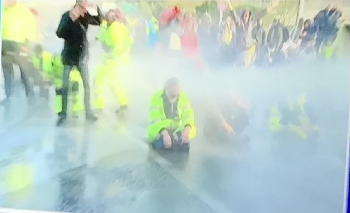 Port of Trieste. At this moment the police attack the demonstration with water cannons